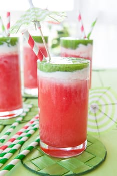 Colorful smoothie in glass with watermelon and kiwi