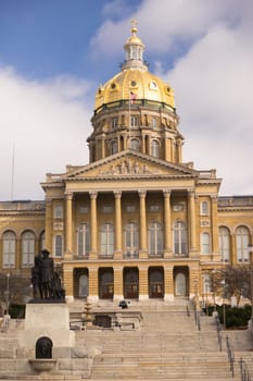 The US and State flags fly at Des Moines Capital