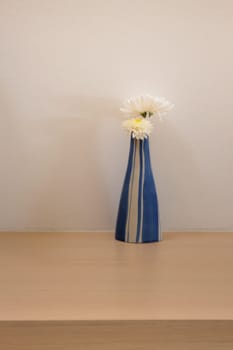 White Flowers Vase Decorated On Table, stock photo