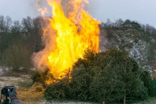 Christmas tree burning is photographed in Central Hesse