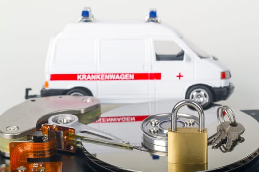Geo-opened hard drive with small padlock in detail