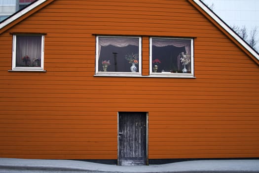 house wood architecture entrance door orange color