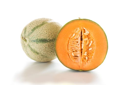 Couple of cantaloupe melon isolated on white background