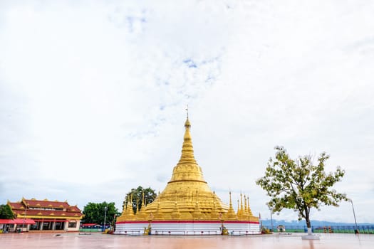 Tachileik Shwedagon Pagoda is a beautiful golden pagoda that imitates Shwedagon Paya Pagoda, tourist attraction near the Thai border at Tachileik town in Shan State, Myanmar