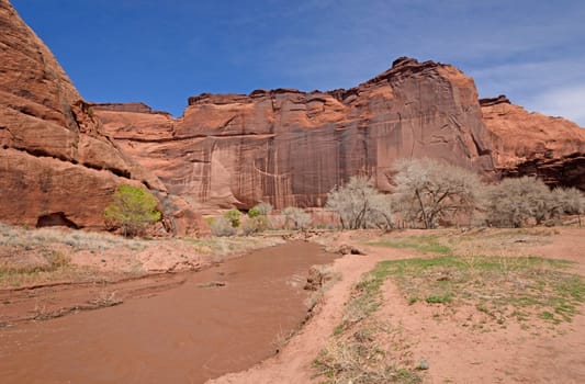 Muddy River in a Red Rock Canyon in Canyon de Chelly National Monument in Arizona