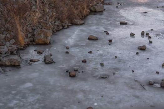 Frozen water surface of a river. The river Ruhr in the city of Essen Kupferdreh..
