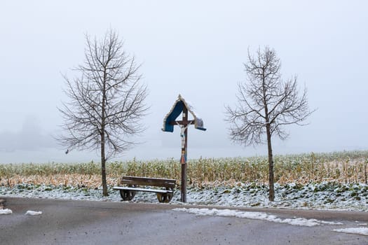 A wooden corridor cross - wayside cross at Axtbrunn in Bavaria - Germany.