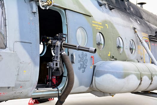 CASLAV, CZECH REPUBLIC - MAY 20, 2017: Machine gun of a multi-purpose helicopter of middle class Mil Mi-171S on static exhibition during the Open Day at Tactical Air Force Base Caslav on May 20, 2017 in Caslav.