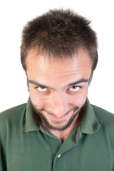 Happy young man making funny faces isolated in white
