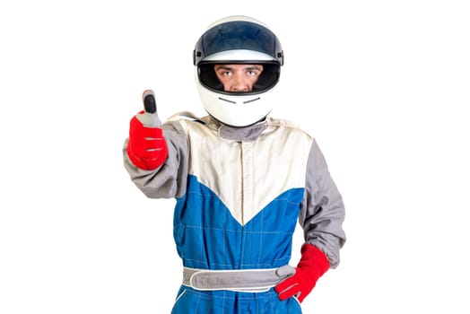 Racing driver posing with helmet isolated in white