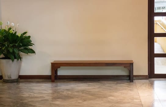 White Wall And Wooden bench, stock photo