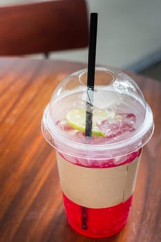 Cold Red Drink With Lime Slice, stock photo