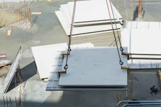 House construction made of steel and concrete for the construction of an apartment building with underground parking with concrete prefabricated walls.