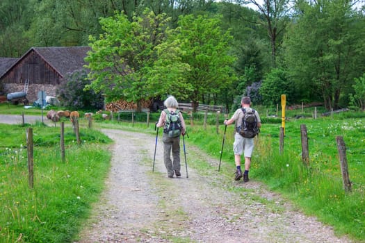 Male and female hikers in Bergisch Land, Germany.