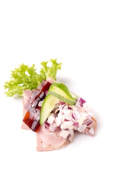 Danish specialties and national dishes, high-quality open sandwich. Sandwich with pork roll sausage, rullepoelse, , jelly and raw red onions, isolated on white background