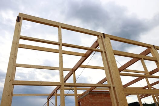 New construction of a wooden house. Modern timber construction