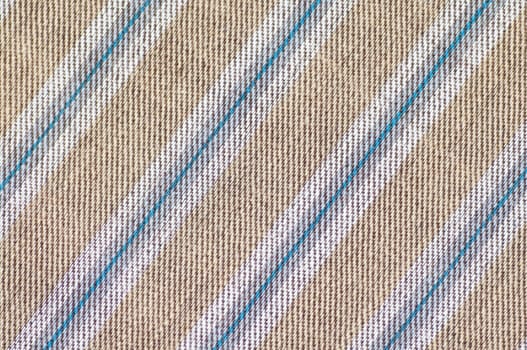 Close up stripes brown and blue fabric pattern texture background.