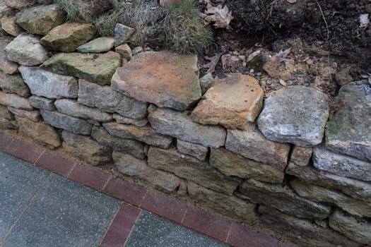 Natural stone wall laid dry with sandstone from the city of Rheine..