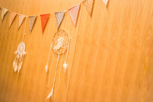 Multi colored triangle flags hanging indoor party, stock photo