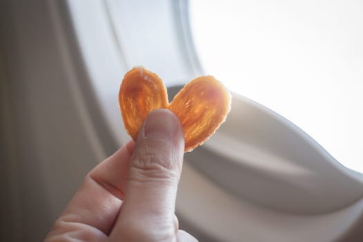 Hand On Sweet Heart Cracker, stock photo