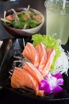 Set Of Sliced Salmon Sashimi And Green Tea, stock photo