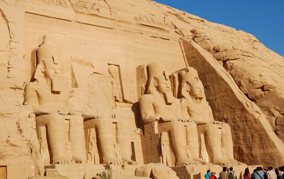 Four large statues of Ramesses II in the facade of Abu Simbel temple, Egypt