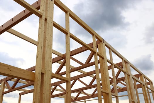 New construction of a wooden house. Modern timber construction