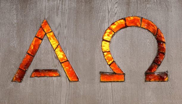 Alpha and Omega Signs in glass.
