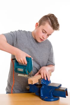 teenager in professional training using padsaw in front of white background