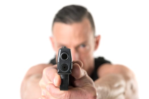 Man with tactical vest and gun isolated in white