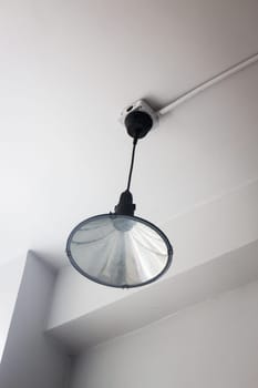 Modern Ceiling Lamp In White Room, stock photo