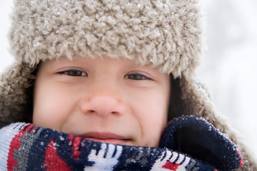 Boy in hat and scarf