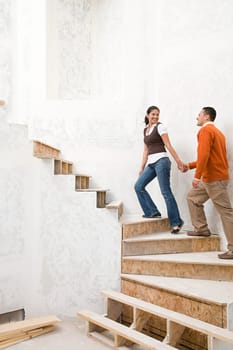 A couple walking up stairs