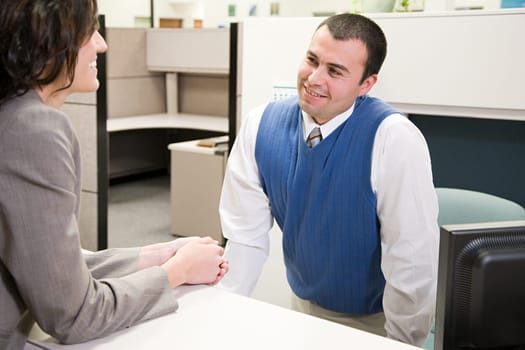 Woman and man in office