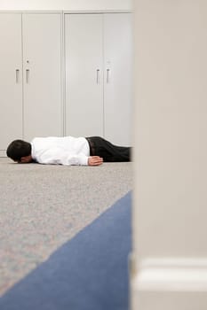 Man on floor of office