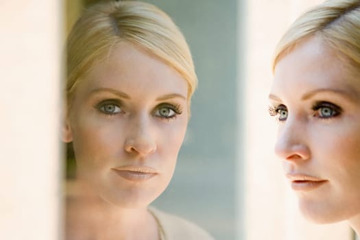 Woman and her reflection