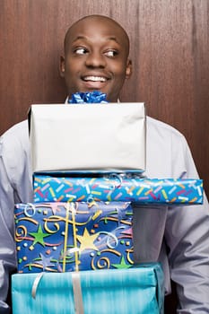 Businessman carrying presents