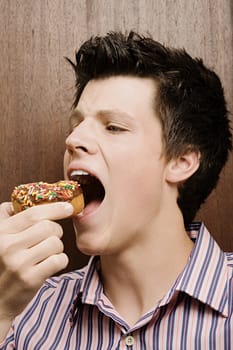 Businessman eating a doughnut