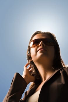 Woman with hands free device