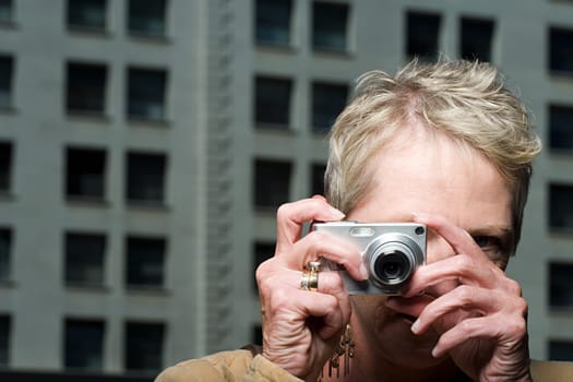 Woman taking a photograph