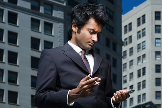 Businessman with handheld computer