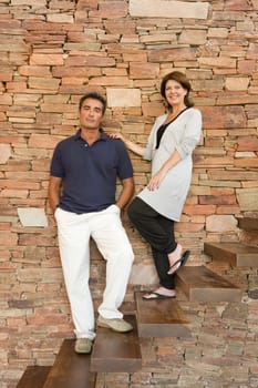 Couple standing on steps