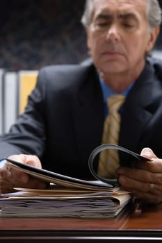 Businessman looking at file