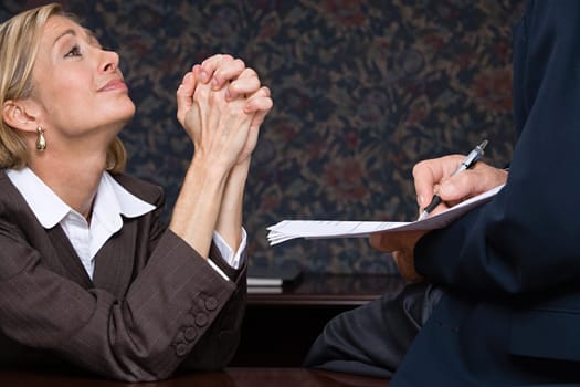 Businesswoman begging