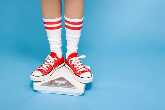 Woman weighing herself
