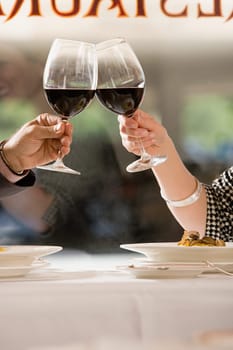 Couple toasting with wine