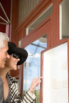 Couple looking at restaurant menu