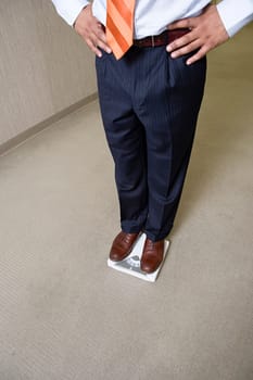 Man weighing himself