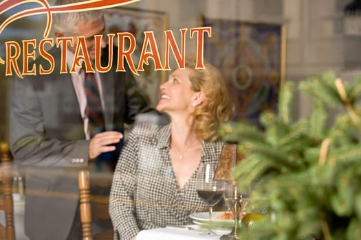 Woman and man in a restaurant
