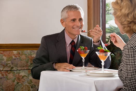 Couple having dessert